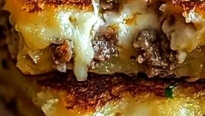 Crispy Potato Pancakes with Savory Beef and Cheese