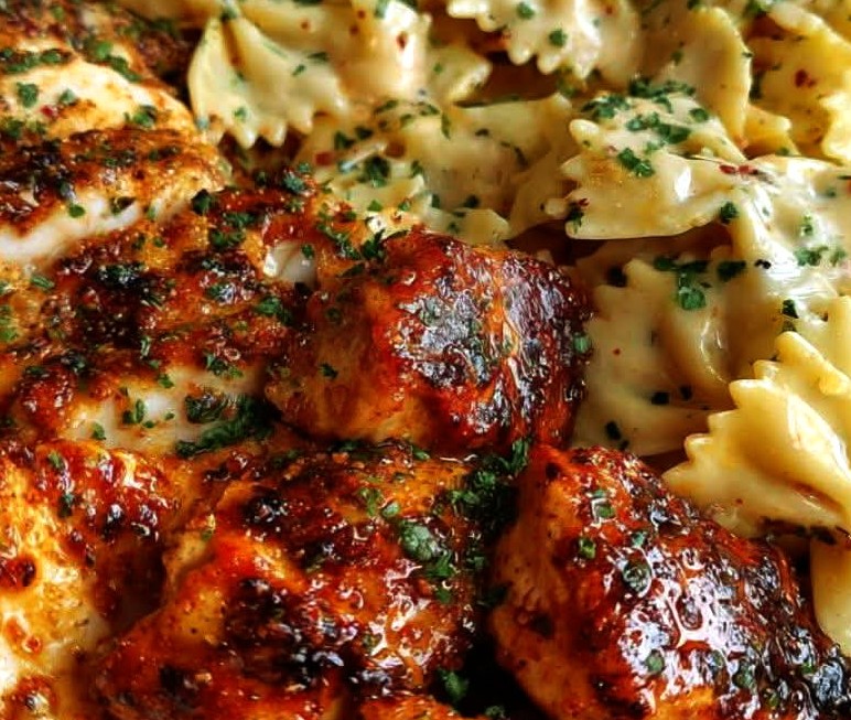 Spicy Cajun Chicken Bowtie Pasta in Creamy Alfredo Sauce